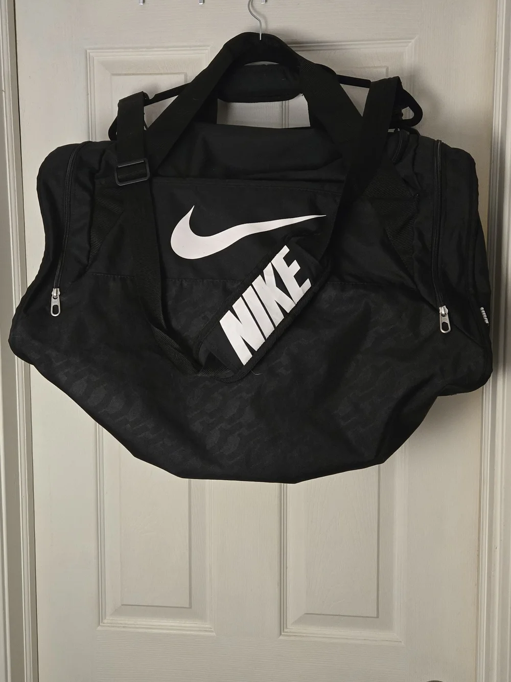 Nike Black Duffel Bag with White Swoosh and Logo